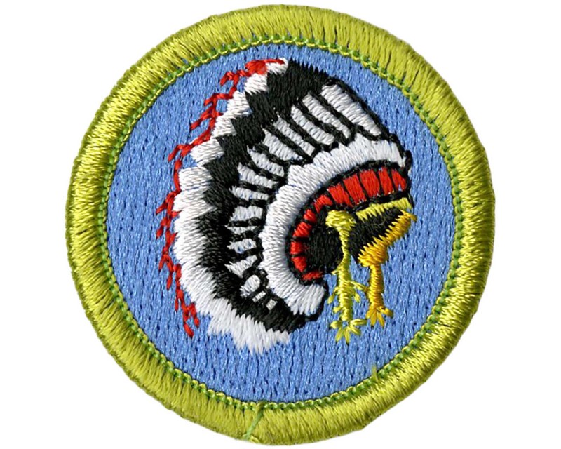 The indian lore merit badge emblem, a native american war bonnet (colloquially known as a feather headdress)